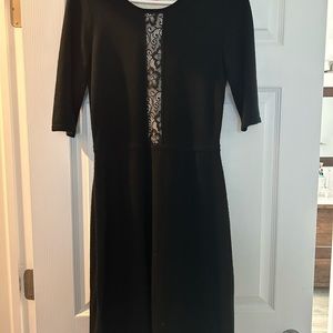 A cozy, knit Betsey Johnston dress with lace detail on the front and back.